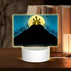 Rectangular Acrylic Night Light, A Halloween Poster With A Castle And Bats In The Sky.