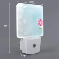 Night Light Set Of 2, A Single Pink Flower Stands Out Against A Blue Background. 3 Night Light Set Of 2, A Single Pink Flower Stands Out Against A Blue Background. -Nuas Diy Shop 0569fc962eff7aabec8e944563e9afb0b443016a