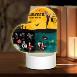 Love Acrylic Night Light, A Poster With A Couple Of People And A Bat On It.