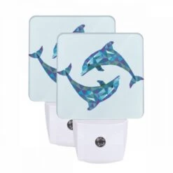Night Light Set Of 2, Two Dolphins Are Swimming Together In The Ocean.