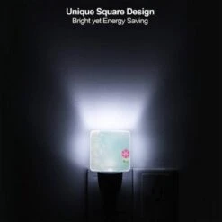 Night Light Set Of 2, A Single Pink Flower Stands Out Against A Blue Background. 5 Night Light Set Of 2, A Single Pink Flower Stands Out Against A Blue Background. -Nuas Diy Shop 28790fc3bdde158b2c5d5c2ba9dacc9a246aa33c