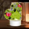 Love Acrylic Night Light, A Green And Black Patterned Fabric With A Pink Ribbon And A Red Box. -Nuas Diy Shop 326efbdb7a4d3df0111c5e5964dbf0c62bc9bf95