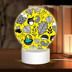 Round Acrylic Night Light, A Pattern Of Birds And Leaves On A Yellow Background.