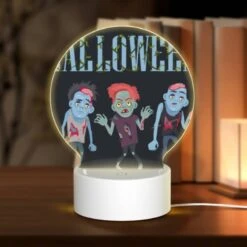Round Acrylic Night Light, Three Zombie Characters Are Shown In A Black And White Image.