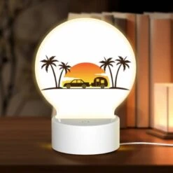 Round Acrylic Night Light, A Car Is Driving Down A Road With A Camper Trailer Attached To It.