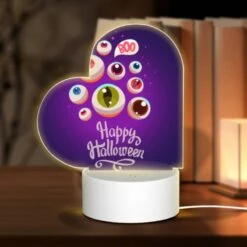 Love Acrylic Night Light, A Purple Background With A Happy Halloween Sign And A Bunch Of Eyes.