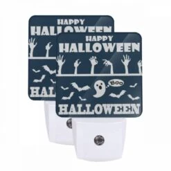 Night Light Set Of 2, A Poster With A Ghost And The Words "Happy Halloween" On It.