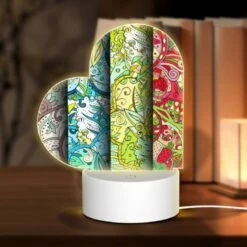 Love Acrylic Night Light, Three Colorful Designs Of Flowers Are Displayed On A Wall.