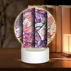 Round Acrylic Night Light, Three Colorful Designs Are Displayed On A Wall.