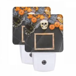 Night Light Set Of 2, A Black Frame With A Skull And Pumpkins In The Background.