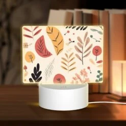 Rectangular Acrylic Night Light, A Collection Of Leaves And Flowers In Various Colors.