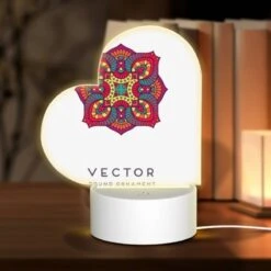 Love Acrylic Night Light, A Colorful Round Ornament With A Design On It.