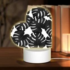 Love Acrylic Night Light, A Black And White Photo Of A Bunch Of Leaves.