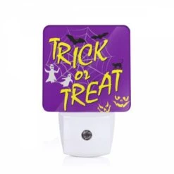 Night Light, A Purple Background With A Spider Web And Bats