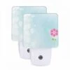Night Light Set Of 2, A Single Pink Flower Stands Out Against A Blue Background. -Nuas Diy Shop 87808c6b0f3529f656ff1259fd47bd5e5817c79a