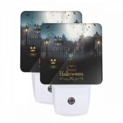 Night Light Set Of 2, A Black And White Image Of A Halloween Scene With A Fence And A Moon In The Background.