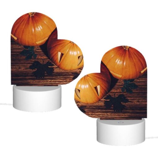 Love Acrylic Night Light, A Pumpkin With A Face Drawn On It Sits On A Table With Other Pumpkins. -Nuas Diy Shop 897d6d71e62b518126f1fd3e1752e893ea91b022