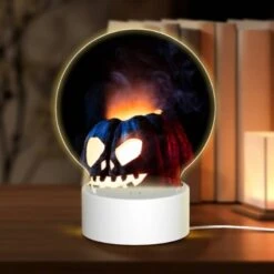 Round Acrylic Night Light, A Carved Pumpkin With A Face And A Flame In The Background.