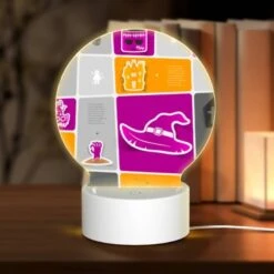 Round Acrylic Night Light, A Collection Of Halloween Images On A Pink Background.