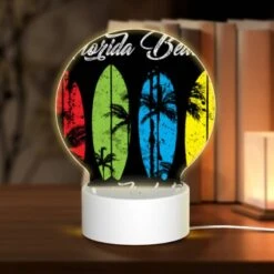 Round Acrylic Night Light, A Black And White Image Of A Surfboard With The Words Florida Beach Paradise Lost Written On It.