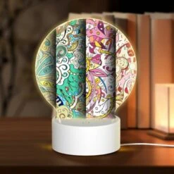Round Acrylic Night Light, Three Colorful Designs Are Displayed On A Wall.