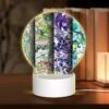 Round Acrylic Night Light, Three Colorful Designs Are Displayed On A Row.