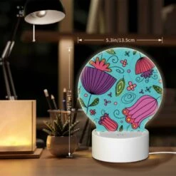 Round Acrylic Night Light, A Colorful Design Of Flowers And Leaves On A Blue Background. -Nuas Diy Shop a170438fef24f3f602328b3aea00fee1019fa607
