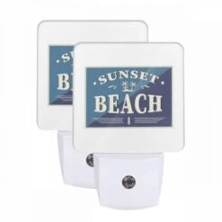 Night Light Set Of 2, A Blue And White Sign That Says "Sunset Beach.".