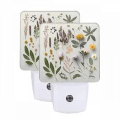 Night Light Set Of 2, A Collection Of Flowers And Plants Are Displayed On A Table.