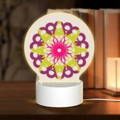 Round Acrylic Night Light, A Colorful Flower With A Yellow Center And Pink Petals.