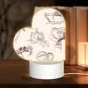 Love Acrylic Night Light, A Collection Of Drawings Of A Woman