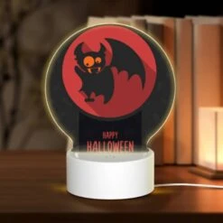 Round Acrylic Night Light, A Red And Black Bat With A Pumpkin On Its Head.
