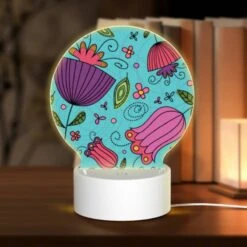Round Acrylic Night Light, A Colorful Design Of Flowers And Leaves On A Blue Background.