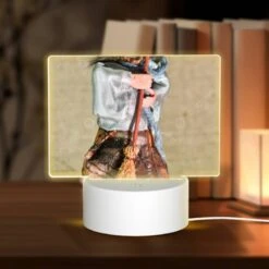 Rectangular Acrylic Night Light, A Doll With A Broom In Its Hand.