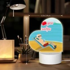 Love Acrylic Night Light, A Man Is Sitting On A Beach Chair With A Drink In His Hand. -Nuas Diy Shop c7ea98964d3fe80f653cf0d834c6a49a617c195f