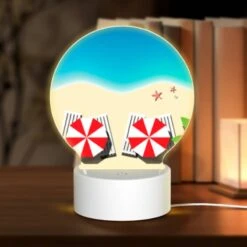 Round Acrylic Night Light, Two Red And White Striped Umbrellas On A Beach.