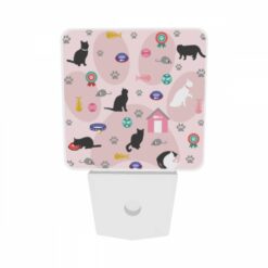Night Light Set Of 2, A Cat Is Laying On A Pink Surface With A Cat House In The Background. -Nuas Diy Shop cc2bc7862f612fda41787631d036bac4fb8ff725