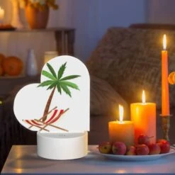 Love Acrylic Night Light, A Palm Tree Is Shown In A Red And White Striped Chair. -Nuas Diy Shop cf627e04bc8aaedbb5937abe712232a986aeae54