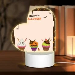 Love Acrylic Night Light, A Halloween Themed Cupcake With A Pumpkin On Top.