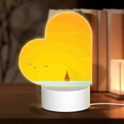 Love Acrylic Night Light, A Boat Is Sailing On The Water With A Beautiful Sunset In The Background.