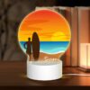 Round Acrylic Night Light, A Man Is Standing On A Beach Holding A Surfboard. -Nuas Diy Shop d9d71923c251113356f56452548fd80ed583049c