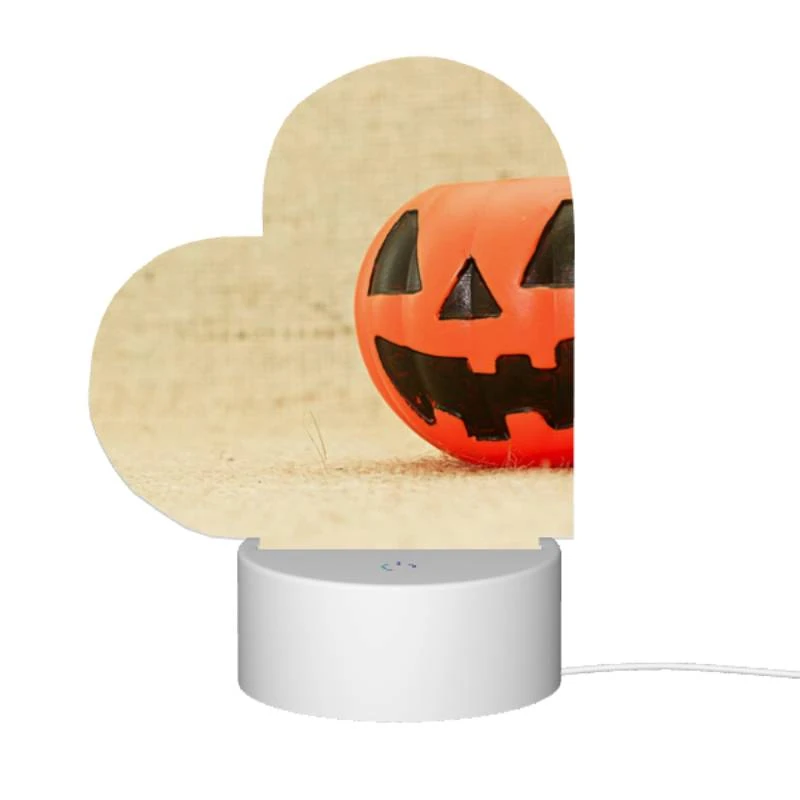 Love Acrylic Night Light, A small orange pumpkin sits on a carpet. Love Acrylic Night Light, A Small Orange Pumpkin Sits On A Carpet. -Nuas Diy Shop ddc59a3928148d640130be8f8ede240abe3a12a5