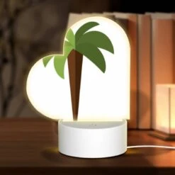 Love Acrylic Night Light, A Green And Brown Carrot Is Sticking Out Of The Ground.