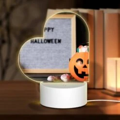 Love Acrylic Night Light, A Happy Halloween Sign Is Displayed Next To A Pumpkin.