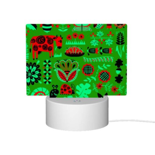Rectangular Acrylic Night Light, A Green And Red Patterned Fabric With Various Plants And Animals On It. -Nuas Diy Shop e4f84901355da281a6f1155067f707210b375675
