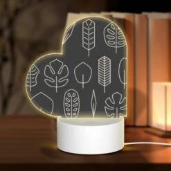 Love Acrylic Night Light, A Collection Of Leaves In Various Shapes And Sizes.