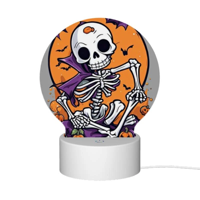 Round Acrylic Night Light, A skeleton is sitting on a pumpkin patch with a bat in the background. Round Acrylic Night Light, A Skeleton Is Sitting On A Pumpkin Patch With A Bat In The Background. -Nuas Diy Shop fdb63a08ce17ddf2329b55b48d1cb7d7f230edfe