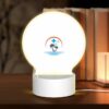 Round Acrylic Night Light, A Logo Of A Palm Tree And A Cross. -Nuas Diy Shop ffee3219ad3d1de400fd9c02cc921a5c1554e308